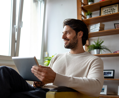 Person working on tablet at home